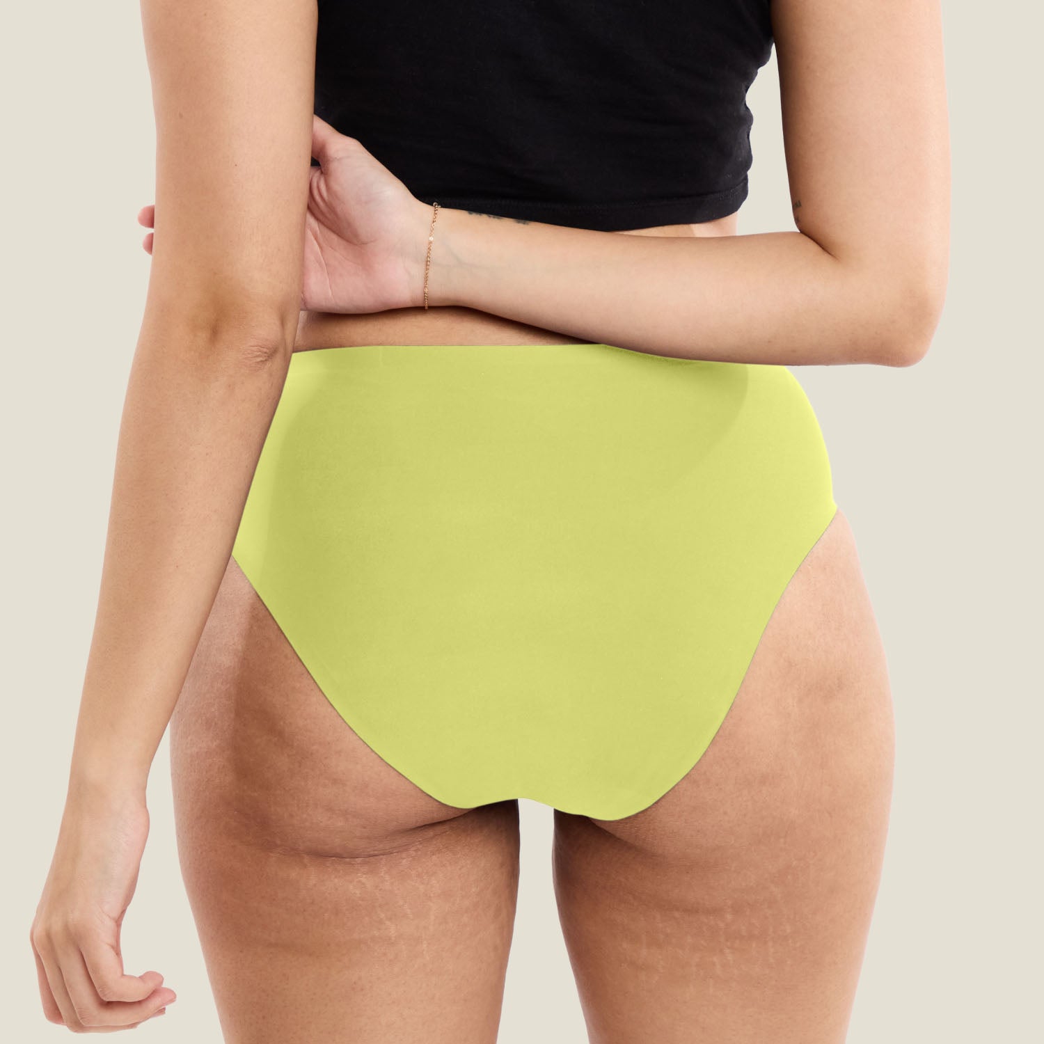 Back view of limited edition Lime Punch WUKA Stretch Midi Brief. Designed for teens with heavy flow, offering secure fit, leak-proof layers, and stretch comfort.