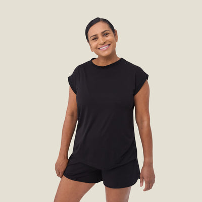Front view of WUKA black pyjama set for menopause, featuring relaxed-fit top and cooling shorts for temperature regulation during sleep.