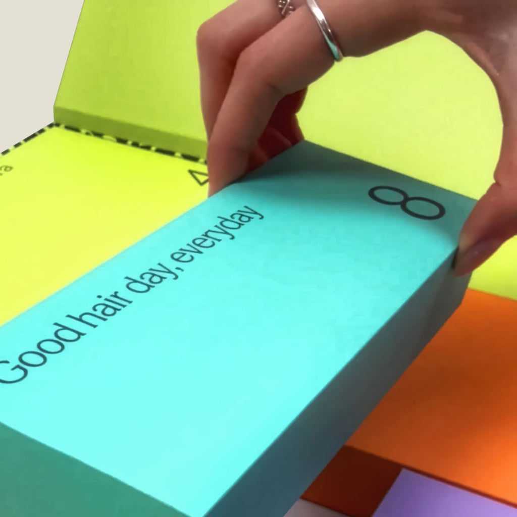 Close-up of WUKA Period Advent Calendar box number 8 with 'Good hair day, everyday' message