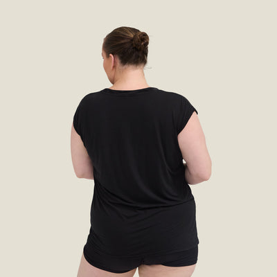 Back view of WUKA Pyjama Jersey T-Shirt in black, highlighting relaxed fit and soft, breathable fabric for menopausal night sweats.