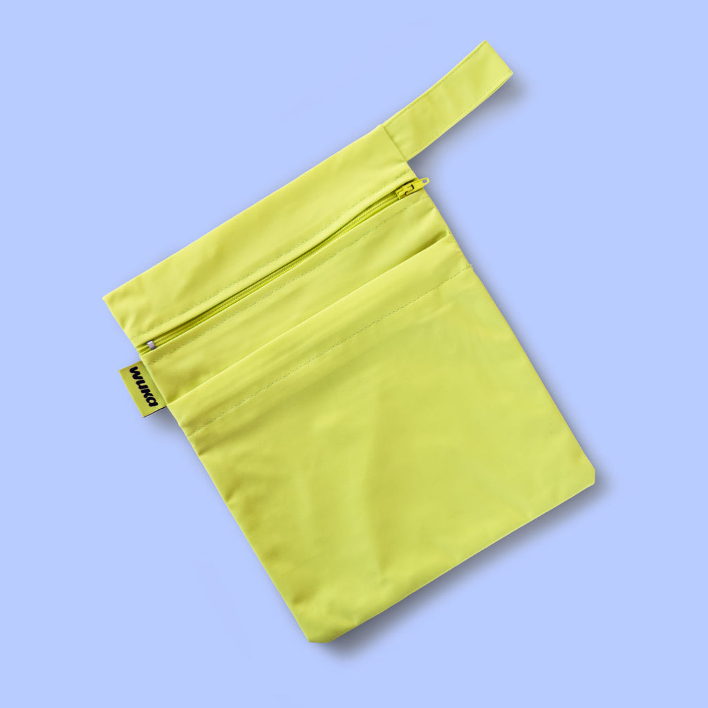 Waterproof changing bag included in the WUKA Lunafly Legsuit period swim kit