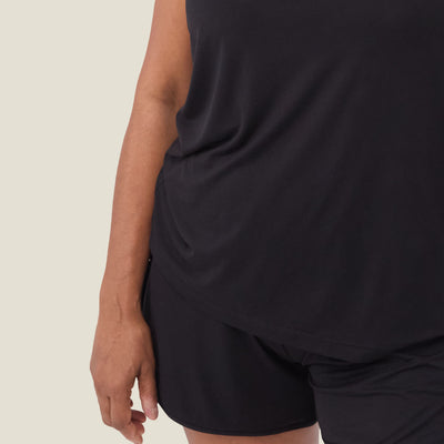 Close-up of WUKA Menopause Pyjama Set detail – soft, hypoallergenic jersey fabric shorts and curved hem top for flexible nighttime wear.