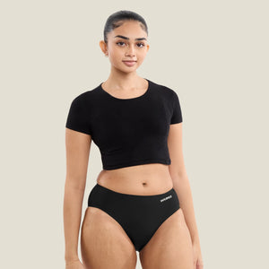 Model wearing WUKA Teen Stretch™ period underwear, representing 5-star reviews for leak-proof protection during heavy flow